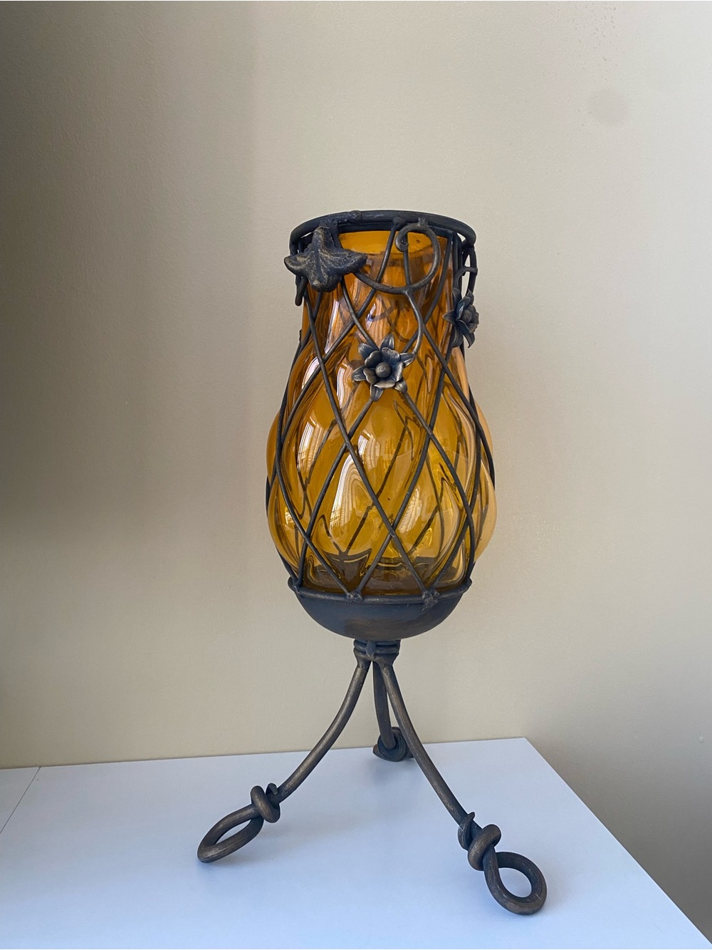 vintage MCM wrought iron caged amber glass candle holder